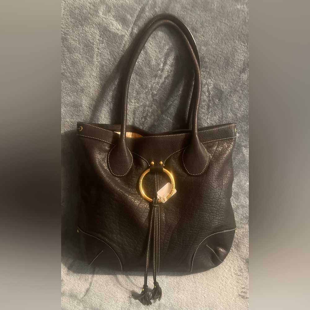 The Sak Black and Gold Tote Bag with Structured Design